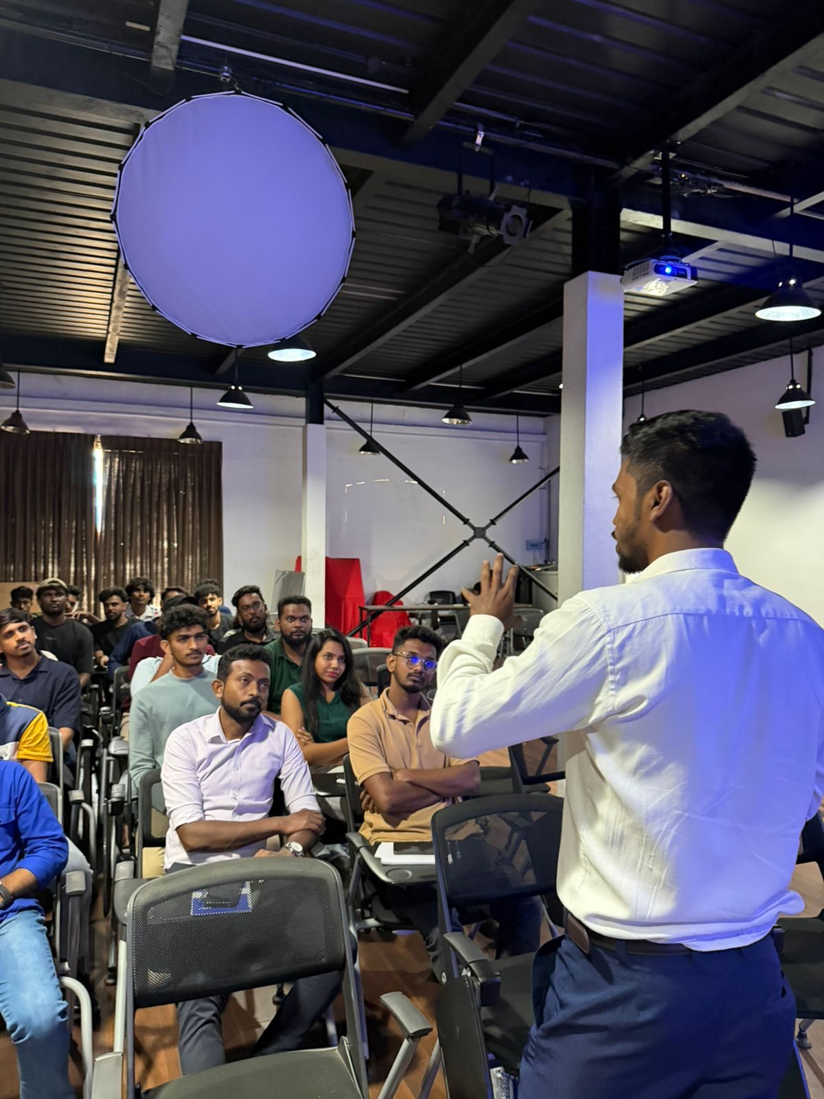 A Cocoon trainer presenting to the Derana team